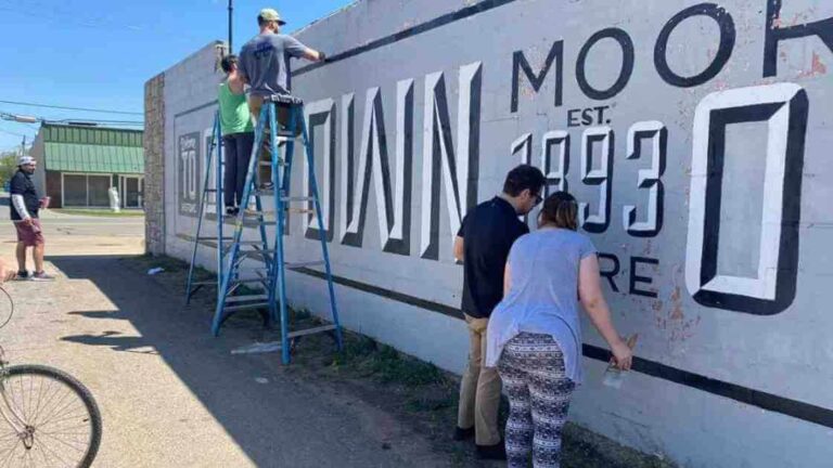 old town moore mural being repainted as part of community improvement project