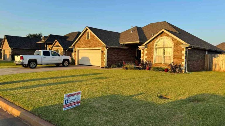 oklahoma city homeowner meeting with contractor in yard talking about fall home improvement projects