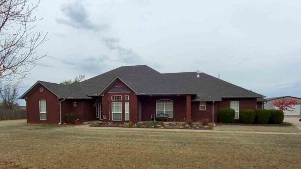 photo of residential home before roof replacement in Harrah, OK