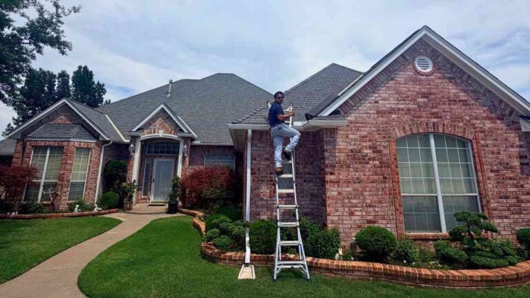 roofer climbing on ladder to perform roof inspection to find out how long does hail damage take to cause roof leaks