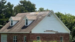 roof missing shingles and other signs homeowner needs roof replacement in Moore
