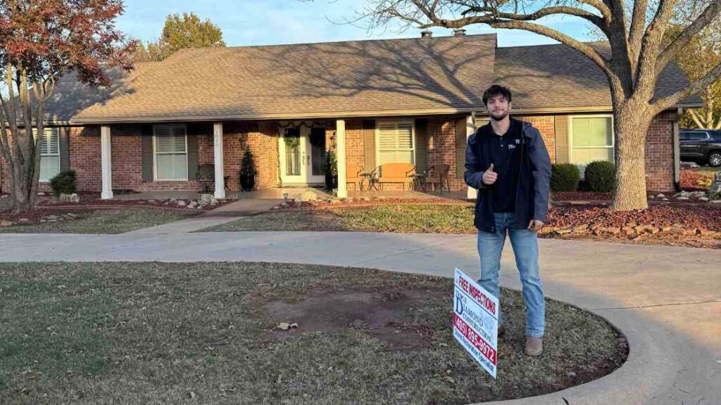 roofer outside of home with sign explaining to homeowner the cost of ignoring hail damage and why repairs need to be made fast