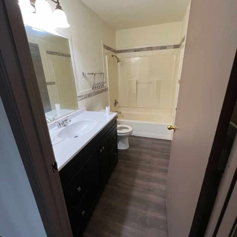 remodeled bathroom after tornado damage repairs were completed by general contractor