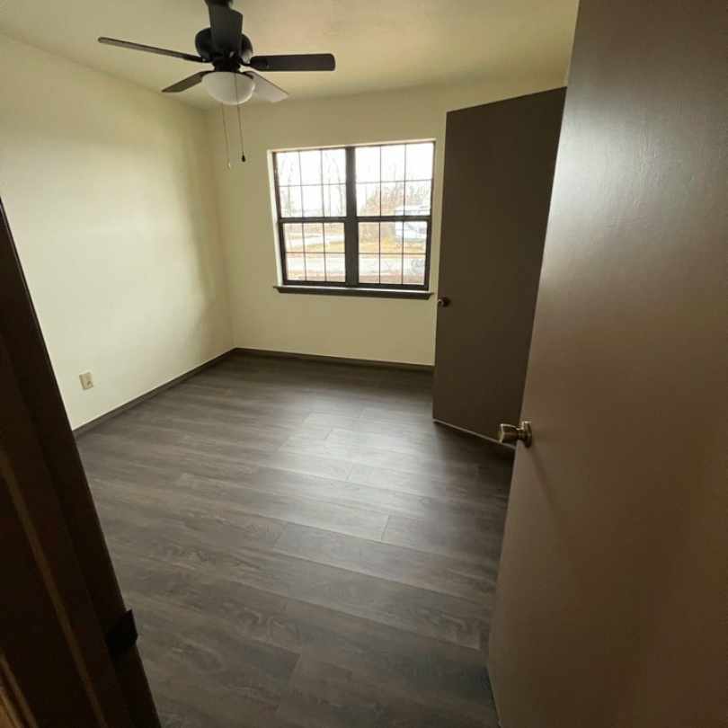 remodeled bedroom after tornado damage repairs were completed by general contractor