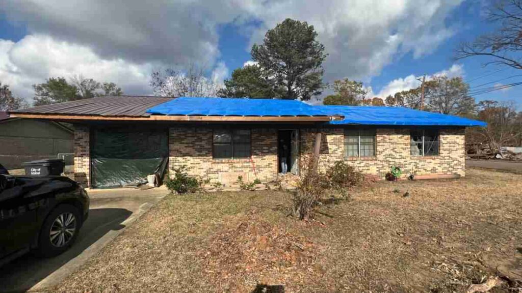 photo of home exterior before tornado damage repairs were made