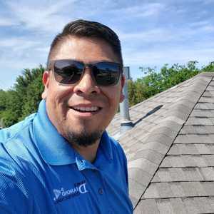 roofer on residential roof