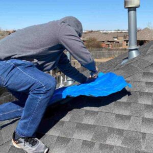 OKC roofer completing emergency roof repairs in Norman, OK