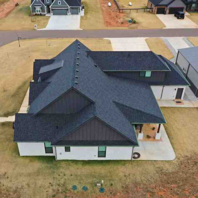 aerial photo of new roof in after storm damage repairs in Guthrie, OK