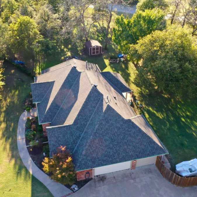 front view of new roof after storm damage repairs in Choctaw