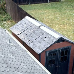 roof with holes caused by hailstorm in Edmond on 9.24.2024