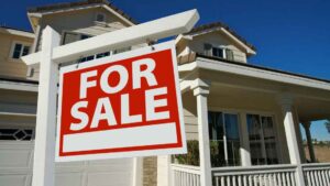 residential home in Oklahoma City with listing sign after completing home repairs to make before selling