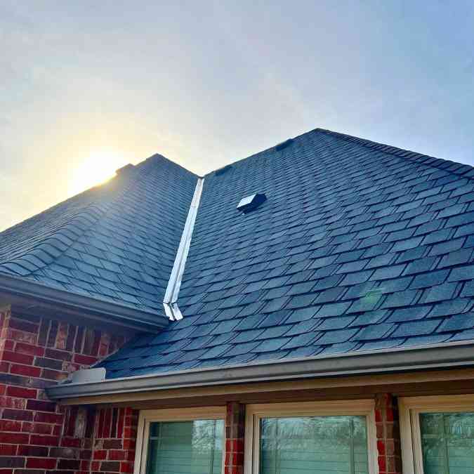 completed roof installation in Stillwater, OK after hail storm damage led to roof leak