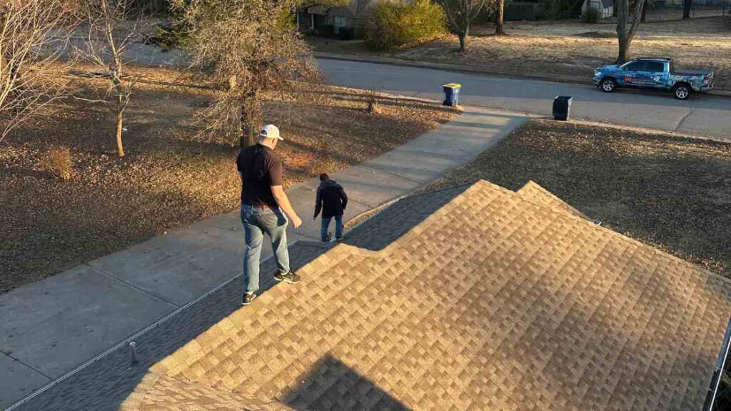 local roofer on residential home providing tips on how to protect your roof from future hail damage and prevent repairs