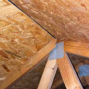 photo inside home attic showing roof rafter separated from nail and needing to repair storm damage in Norman, OK