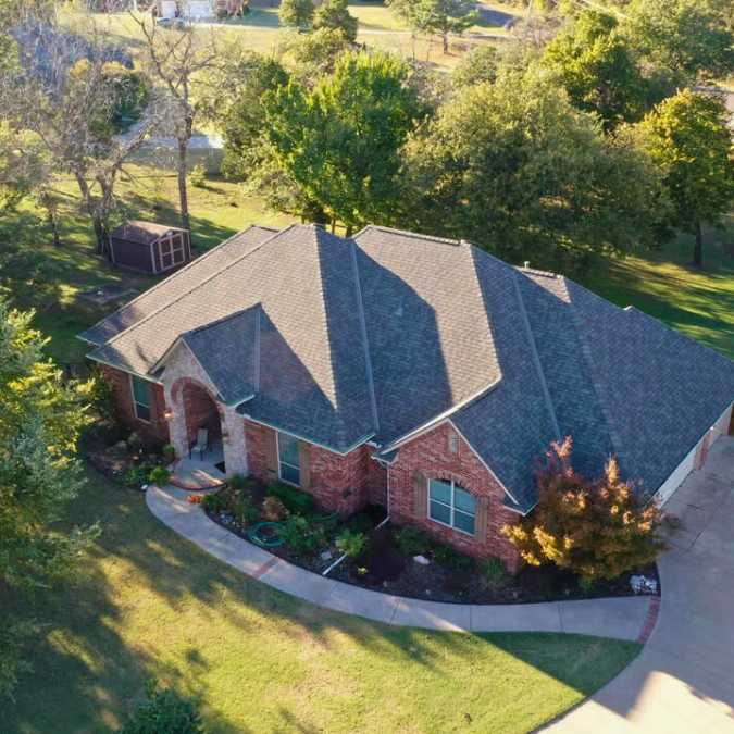 completed roof replacement project in Choctaw, OK done by Triple Diamond Construction