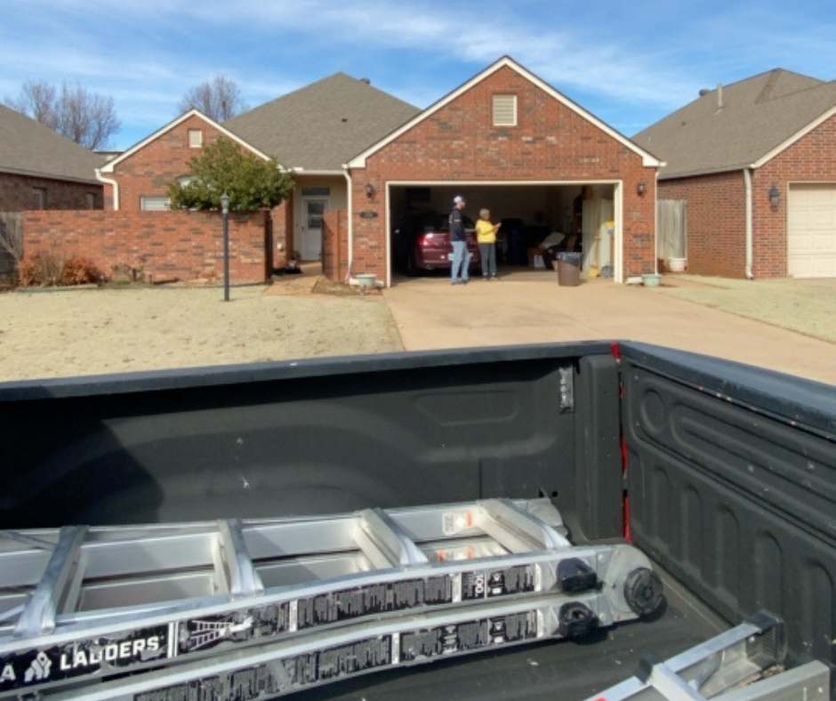 OKC roofer giving hail damage inspection to home after storm