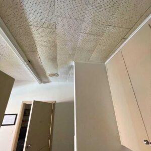 ceiling water stains found during roof inspection for commercial building in OKC