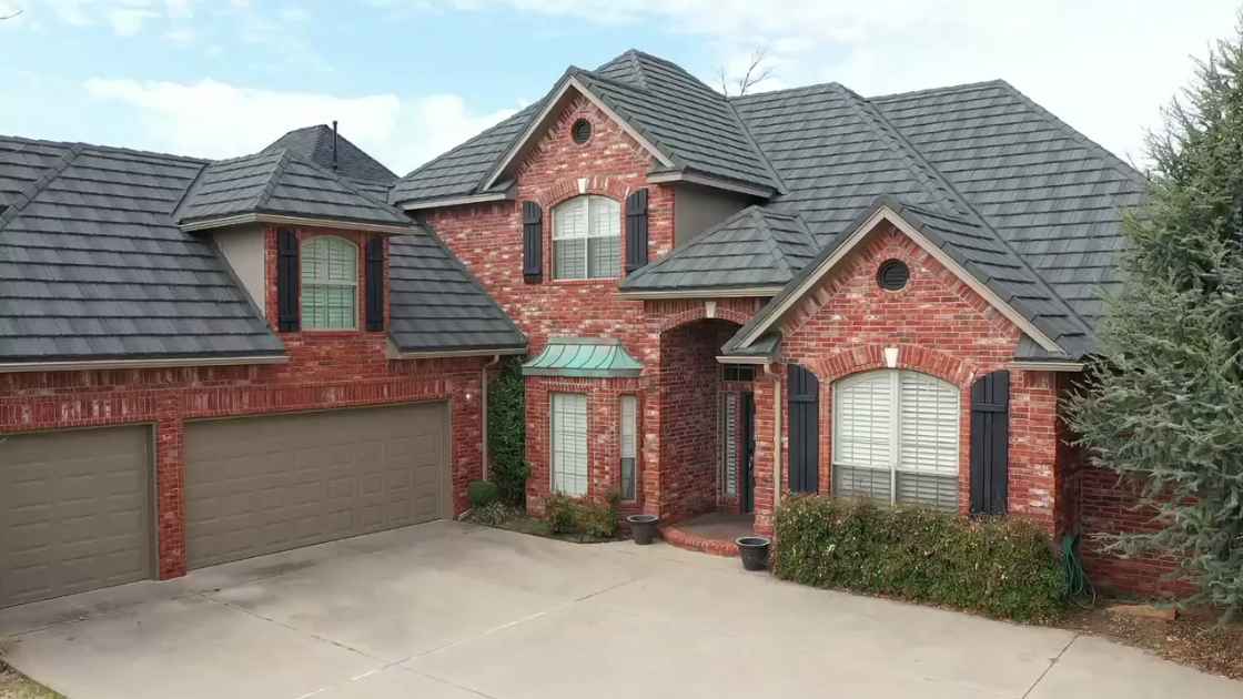 energy efficient home upgrades include stone coated steel metal roof on residential home in Oklahoma City