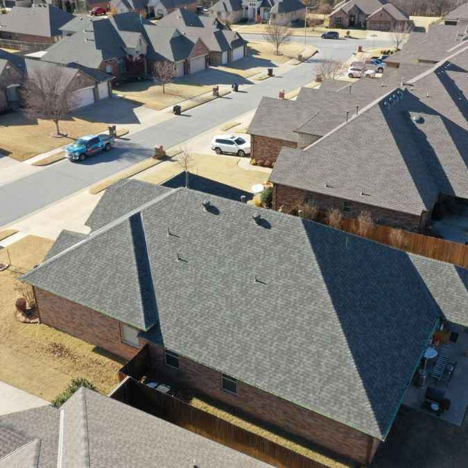 side view of roof replacement in Oklahoma City from drone