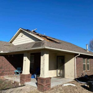residential home in Norman, OK with tornado damage after Feb 26 storm