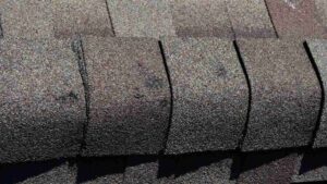 what hail damage looks like on a shingle roof in Oklahoma City