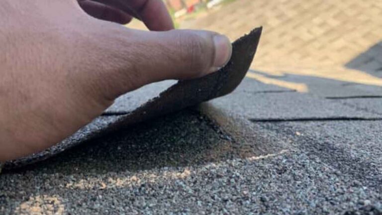 photo of wind damage on residential home in Oklahoma City during roof inspection